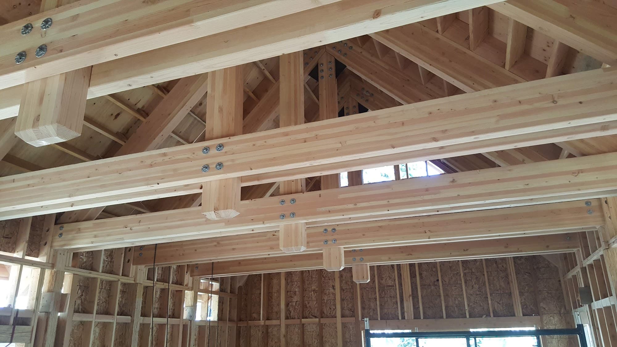 Wood frame construction showing platform framing techniques and structural connections