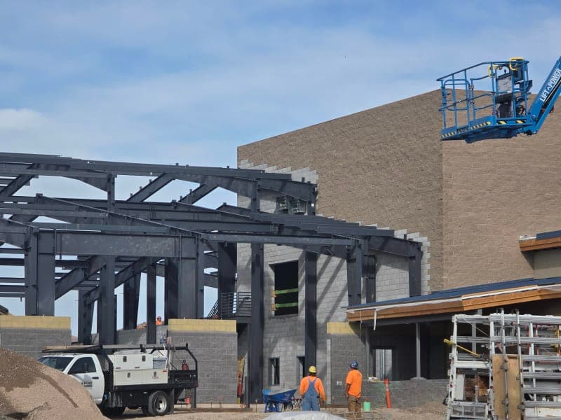 Getto Transportation Center during construction — steel framing and block walls with elevated work platform